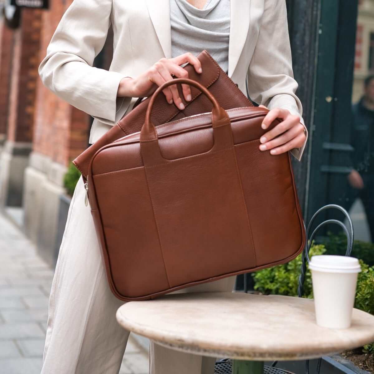 Detail of the high durability cotton lining and Italian polished Raccagni zippers in the Arsante Classic Leather Briefcase, Whisky Brown.