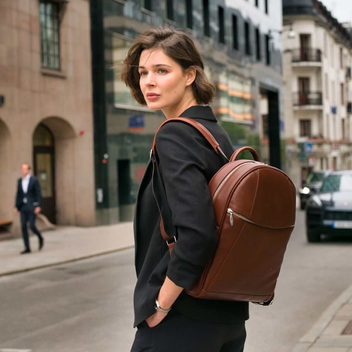 A Whisky Brown Arsante Backpack, handmade from full-grain Bovine leather for a luxury on-the-go look.