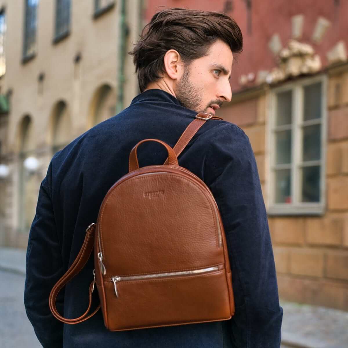 This is a photo of an Arsante® Backpack in Whisky Brown, perfect for daily adventures.