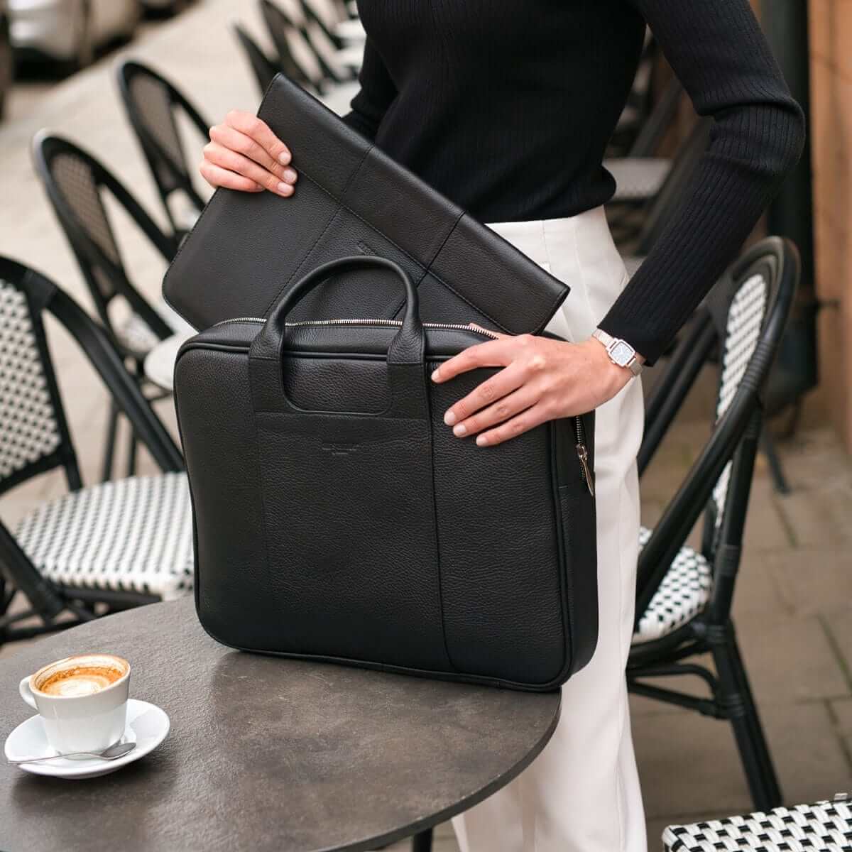 Detailed craftsmanship of the Arsante Classic Briefcase, made in a Nordic atelier, showcasing high durability cotton lining and Italian polished Raccagni zippers