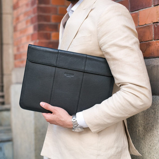 A close-up of the Arsante Laptop Sleeve with a secure magnetic closure.